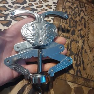 Corkscrew and bottle stopper